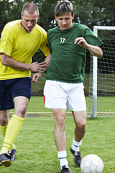 Two soccer players on field - STKF000659