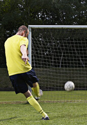 Soccer player scoring a goal - STKF000673