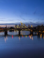 Germany, Hesse, Frankfurt am Main, financial district, Ignatz-Bubis-Bridge, skyline in the evening - AMF001197