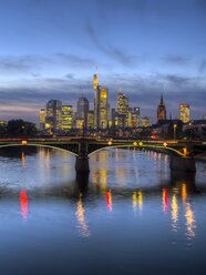 Germany, Hesse, Frankfurt am Main, financial district, Ignatz-Bubis-Bridge, skyline in the evening - AMF001198