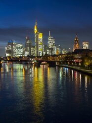 Germany, Hesse, Frankfurt am Main, financial district, Ignatz-Bubis-Bridge, skyline in the evening - AM001219