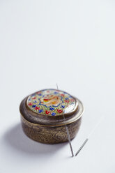 Acupuncture needles and pill box, close up - MYF000068