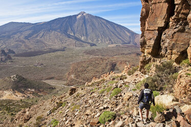 Spain, Canary Islands, Tenerife, Roques de Garcia, Mount Teide, Teide National Park, Female hiker in the Caldera de las Canadas - UMF000677