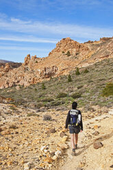 Spain, Canary Islands, Tenerife, Roques de Garcia, Teide National Park, Female hiker in the Caldera de las Canadas - UMF000680