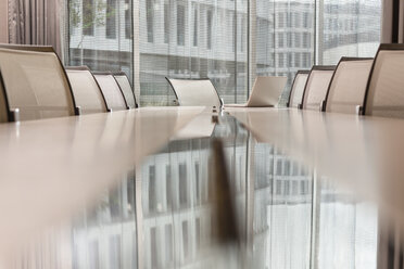 Poland, Warzawa, conference table with reflection of facade at hotel - MLF000326