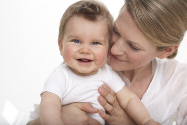 Smiling baby boy and his mother - FSF000010