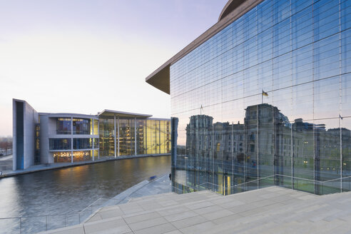 Germany, Berlin, Paul Loebe House, rigth reflection of Reichstag in the glass facade of Marie Elisabeth Lueders Building - MS003107