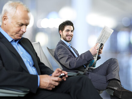 Two businessmen waiting - STKF000688