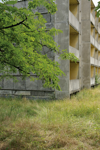 Germany, Brandenburg, Wustermark, Olympic village 1936, facade of decaying concrete tower block stock photo