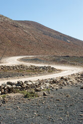 Spain, Fuerteventura, road in between volcanic landscape - VI000186