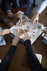 Germnay, Neuss, Hands reaching for pizza - STKF000717