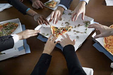 Germnay, Neuss, Hands reaching for pizza - STKF000867
