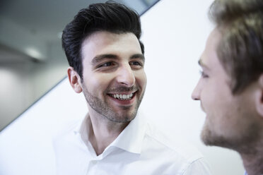 Germany, Neuss, Businessmen talking - STKF000742