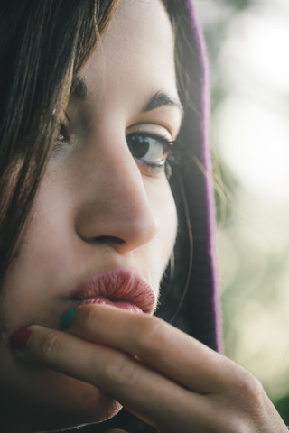 Portrait of young woman pouting mouth stock photo