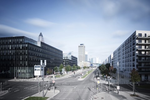 Germany, Hesse, Frankfurt, crossroad at European quarter with view to skyline stock photo