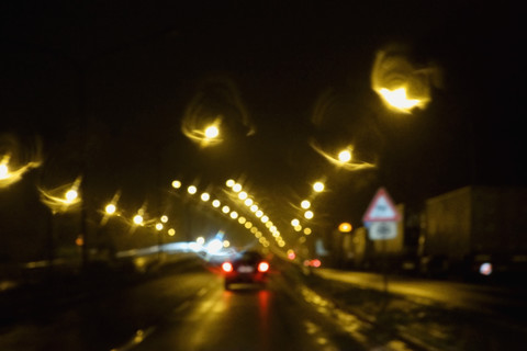 Fahren bei Nacht im Winter, lizenzfreies Stockfoto