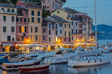 Italy, Liguria, Portofino, Boats in harbour at blue hour - AMF001504