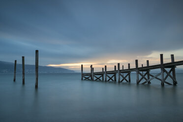 Germany, Baden-Wuerttemberg, Reichenau Island, wooden boardwalk at twilight - ELF000725