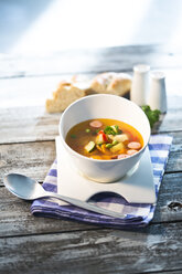 Vegetable soup with sausage in bowl - MAEF007568
