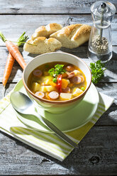 Vegetable soup with sausage in bowl - MAEF007569