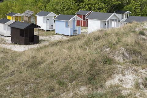 Sweden, Trelleborg, small wooden beach houses at dune stock photo