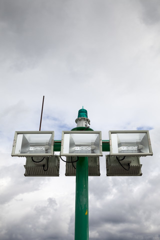 Germany, Fehmarn, Puttgarden, Headlights at harbour stock photo