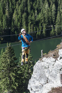 Austria, Salzburg State, Altenmarkt-Zauchensee, man at via ferrata - HHF004703