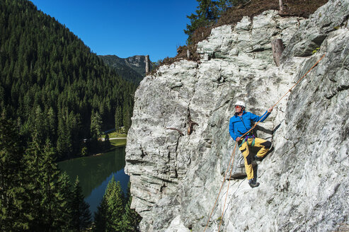 Austria, Salzburg State, Altenmarkt-Zauchensee, man at via ferrata - HHF004704