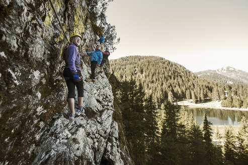 Austria, Salzburg State, Altenmarkt-Zauchensee, family at via ferrata - HHF004714