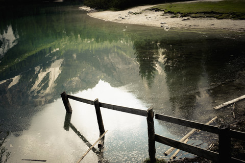 Italy, Trentino-Alto Adige, Alto Adige, Puster Valley, water reflection and lakeshore of Lake Prags stock photo