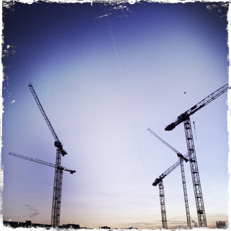 Cranes in the evening sky, site of the Berliner Stadtschloss, Germany, Berlin. - ZMF000020