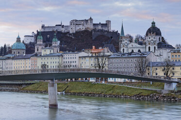 Austria, Salzburg State, Salzburg, fortress Hohensalzburg with old town and towers of Salzburg Cathedral, Salzach River, right collegiate church - GF000344