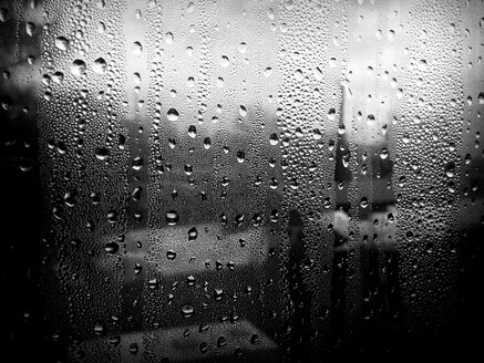 Raindrops on a window, warship in the (unfocussed) backdrop, Hamburg, Germany - FBF000137