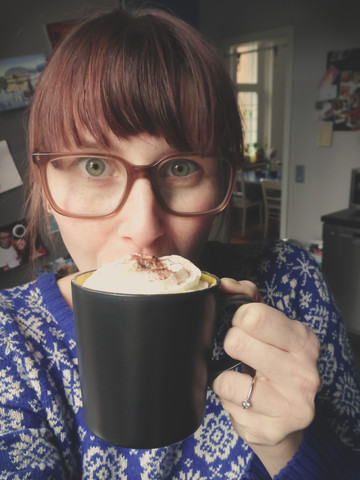 Woman with coffee cup at home, selfie, Bonn, NRW, Germany stock photo