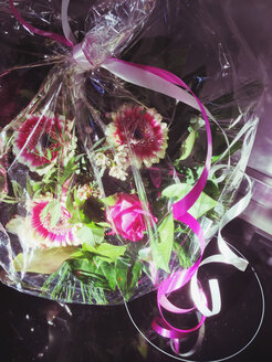 Bouquet of pink flowers with a ribbon, Bonn, North Rhine-Westphalia, Germany - MEAF000064