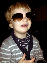 Little boy wearing mother's sunglasses, Palermo, Sicily, Italy - MEAF000072