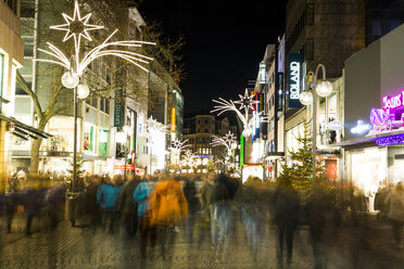 Germany, North Rhine-Westphalia, Cologne, shopping street Schildergasse by night - JAT000574