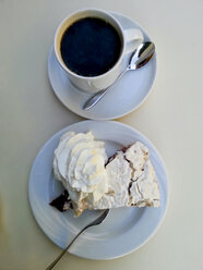 Cup of coffee and cherry pie with whipped cream, Germany - CSF020667