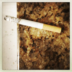 Cigarette on granite - KSWF001223