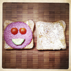 Happy sandwich: toast, salami, tomato, cucumber. Smiling - ZMF000137