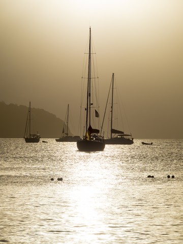 Caribbean, Antilles, Lesser Antilles, Saint Lucia, sailing yachts at sunset stock photo