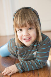 Portrait of smiling little girl with hoodie sweater - LVF000492