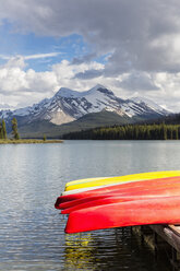 Canada, Alberta, Jasper National Park, Maligne Mountain, Maligne Lake, Canoes on jetty - FOF005786