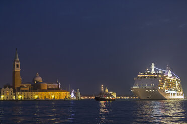 Italy, Venice, Cruise ship at San Giorgio Maggiore at night - FO005827