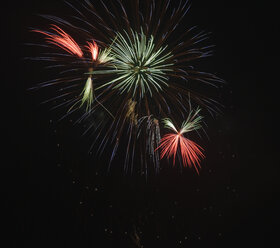 Germany, Bavaria, Kochel am See, fireworks at night sky - LA000471