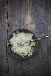 Bowl of sauerkraut on wooden table - LVF000505