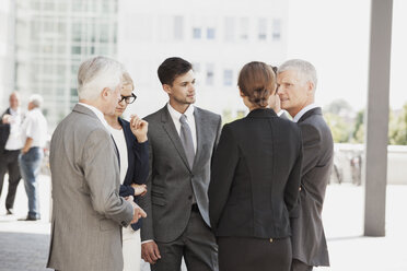 Group of businesspeople discussing - CHAF000055