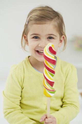 Germany, Girl with lolly pop stock photo