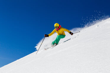 Switzerland, Graubuenden, Obersaxen, female Skier - EGF000019