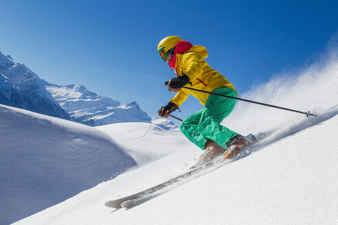 Switzerland, Graubuenden, Obersaxen, female Skier - EGF000099